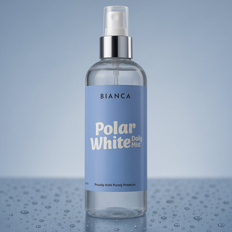 myBIANCA Polar White Daily Mist bottle on a cool blue background with water droplets, showcasing the fresh, clean fabric spray.